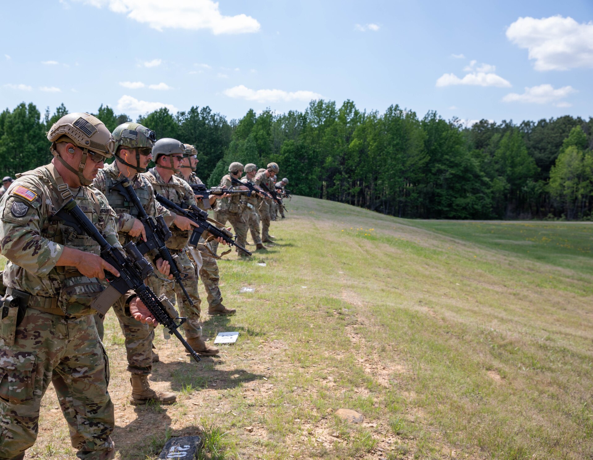 U.S. Army Staff Sgt. Adam Brown receives the Chief's 50 badge for marksmanship excellence during the Winston P. Wilson Championship hosted by the National Guard Marksmanship Training Center in Camp Robinson, Arkansas, from April 27-May 3, 2024. The WPW competition showcases the adaptiveness, resilience, and lethality of our forces, affirming the readiness of National Guard citizen-Soldiers to meet the nation’s challenges. (U.S. Army National Guard photo by Sgt. Destini Keene)