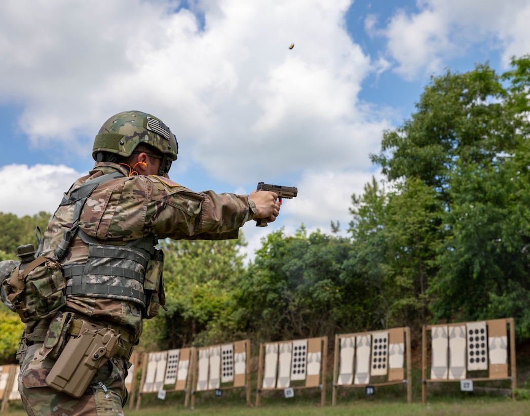 U.S. Army Staff Sgt. Adam Brown receives the Chief's 50 badge for marksmanship excellence during the Winston P. Wilson Championship hosted by the National Guard Marksmanship Training Center in Camp Robinson, Arkansas, from April 27-May 3, 2024. The WPW competition showcases the adaptiveness, resilience, and lethality of our forces, affirming the readiness of National Guard citizen-Soldiers to meet the nation’s challenges. (U.S. Army National Guard photo by Sgt. Destini Keene)