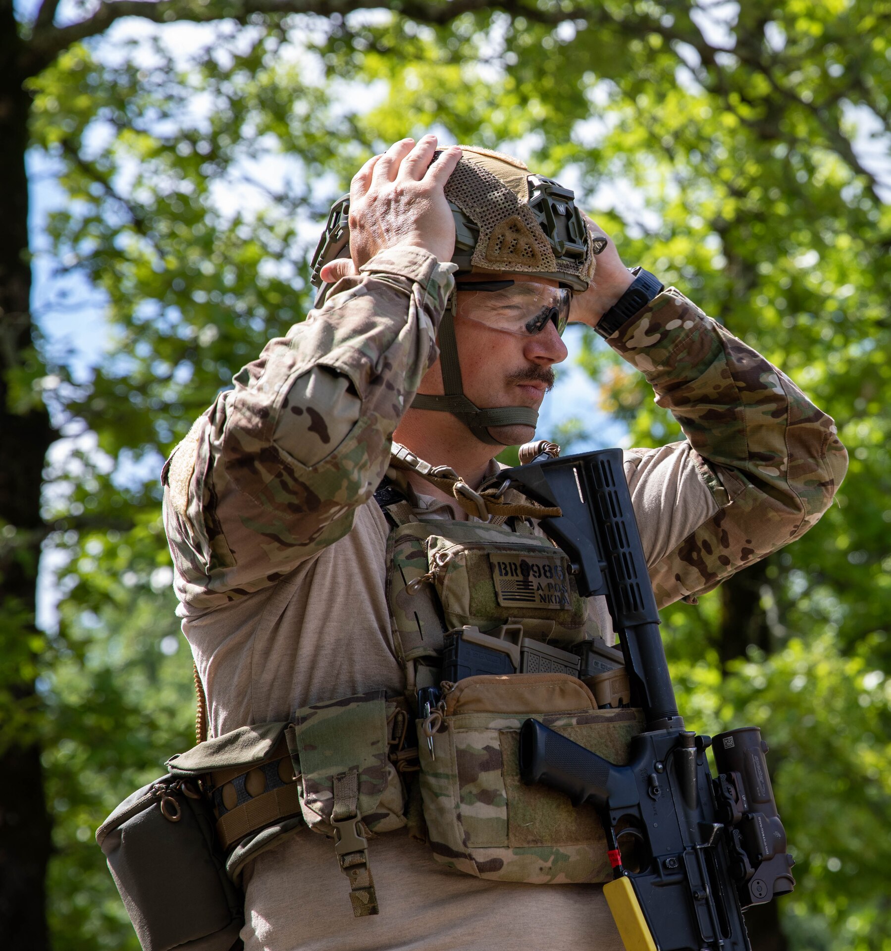 U.S. Army Staff Sgt. Adam Brown receives the Chief's 50 badge for marksmanship excellence during the Winston P. Wilson Championship hosted by the National Guard Marksmanship Training Center in Camp Robinson, Arkansas, from April 27-May 3, 2024. The WPW competition showcases the adaptiveness, resilience, and lethality of our forces, affirming the readiness of National Guard citizen-Soldiers to meet the nation’s challenges. (U.S. Army National Guard photo by Sgt. Destini Keene)