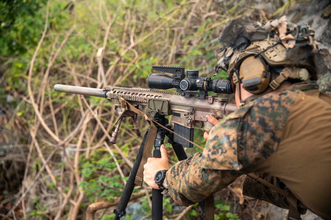 U.S. Marine Corps Cpl. Jonathan Maricle, a squad leader assigned to Alpha Company, Battalion Landing Team 1/5, 15th Marine Expeditionary Unit, shoots an M110 semi-automatic sniper system  during a sniper live-fire range at Oyster Bay, Philippines, April 29, 2024. Balikatan is an annual exercise between the Armed Forces of the Philippines and U.S. Military designed to strengthen bilateral interoperability, capabilities, trust, and cooperation built over decades of shared experiences. (U.S. Marine Corps photo by Sgt. Patrick Katz)