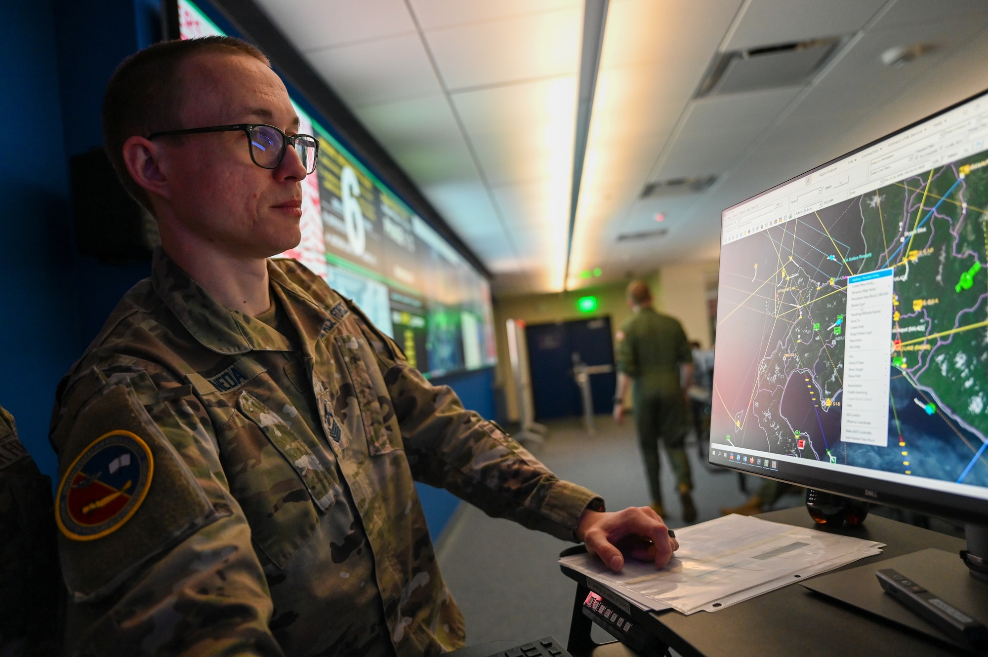U.S. Space Force Master Sgt. Patrick Pineda, U.S. Air Force Academy instructor, facilitates a capstone project inside the Multi-Domain Lab at the Air Force Academy, in Colorado, May 3, 2024. Pineda is the first enlisted Guardian to serve as an academic instructor at the Academy. (U.S. Air Force photo by Staff Sgt. Michael Ward)