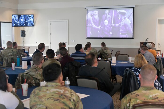 Guests view a documentary during Hill’s Holocaust Remembrance Day luncheon May 6, 2024, at Hill Air Force Base, Utah. The event was part of the Holocaust Days of Remembrance occurring May 5-12 this year. Holocaust Days of Remembrance is the nation’s annual commemoration of the Holocaust to remember those murdered, honor the survivors, pay tribute to the rescuers, and celebrate the liberators involved in these tragic events of World War II. (U.S. Air Force photo by Todd Cromar)