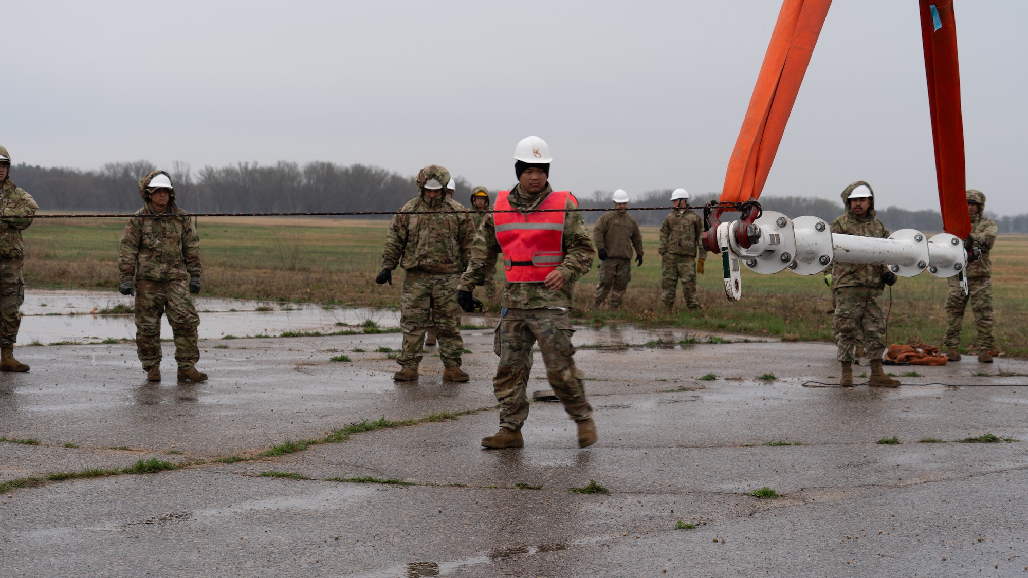 U.S. Air Force Airmen assigned to the 146th Maintenance Group part of the 146th Airlift Wing based on Channel Islands Air National Guard Station (CIANGS), practice executing the fundamentals of Crash Damaged and Disabled Aircraft Recovery (CDDAR) on Volk Field in Camp Douglas, Wisconsin April 16-18, 2024. The CDDAR certified members and augmentees used airbags, forklifts and cranes to raise, pull and stabilize aircraft that simulated different scenarios of downed airplanes. (U.S. Air National Guard photo by Staff Sgt. Kalia Jenkins)