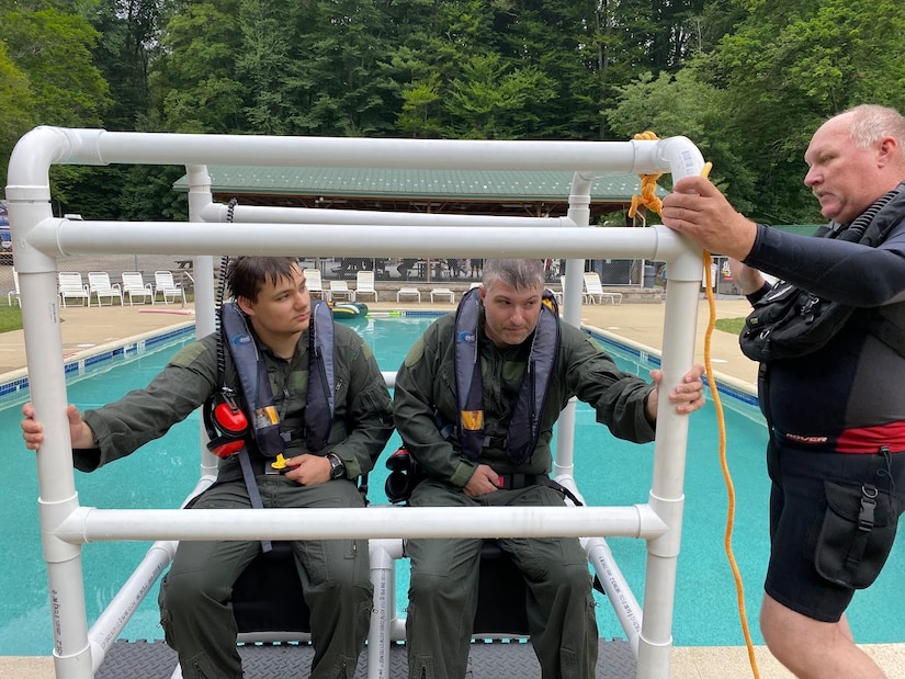 Civil Air Patrol members participate in a water survival lesson at Hawk Mountain Ranger School, Kempton, Pa., July 2022. The school is a specialized training center that provides CAP members aircrew survival training, which CAP-USAF and 305th Operations Support Squadron has been supporting since 2022. (Courtesy photo)