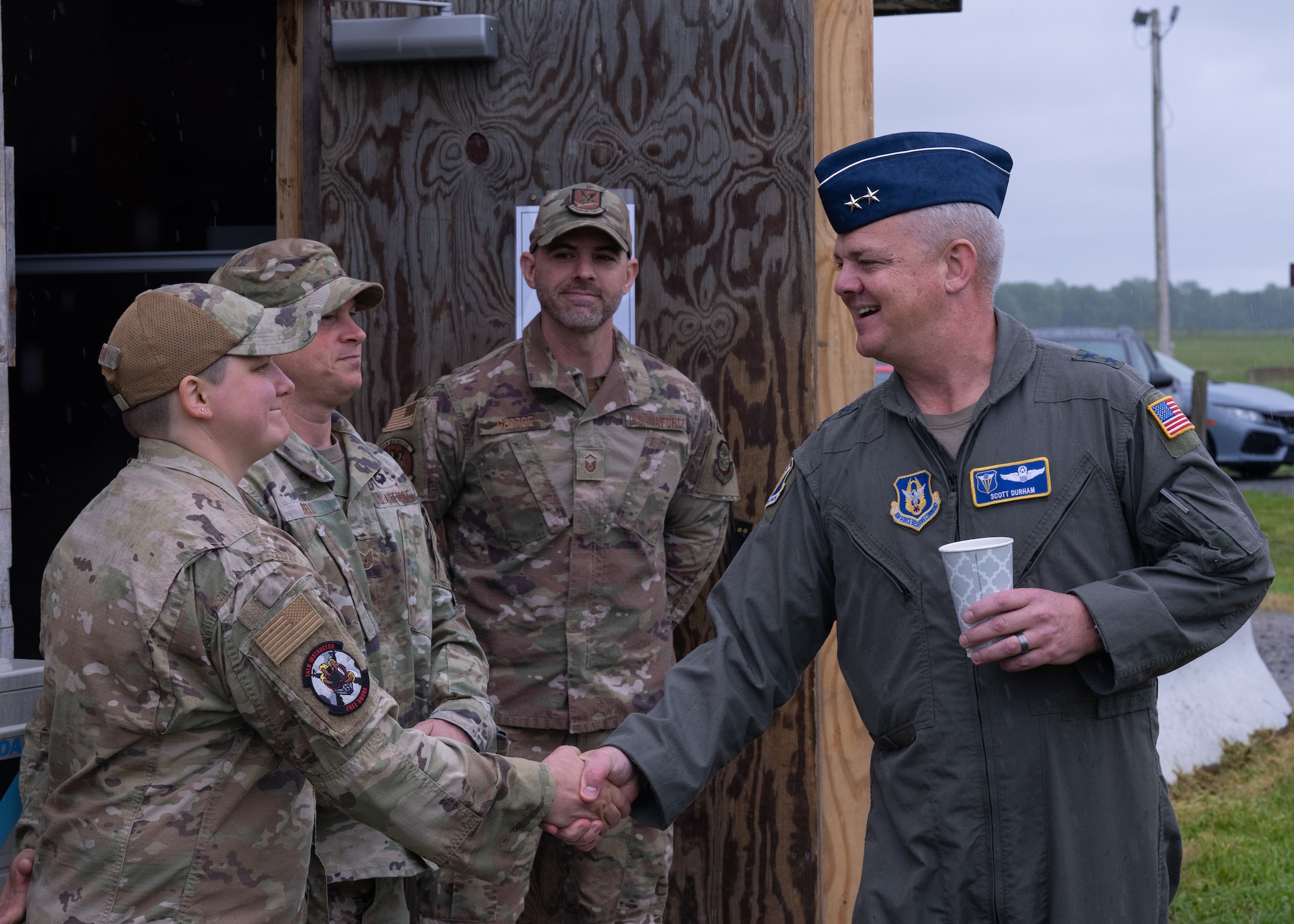 Maj. Gen. D. Scott Durham, 4th Air Force commander, meets (from left) Staff Sgt. Karleigh Marin and Tech Sgt. Jason Bell, Tactics and Leadership Nexus cadre and Master Sgt. Forrest George, TALN course chief, May 4, 2024, on Dover Air Force Base, Delaware. TALN is a two-day scenario-based course designed to increase readiness and hone tactical and leadership skills. (U.S. Air Force photo by Senior Airman John Rossi)