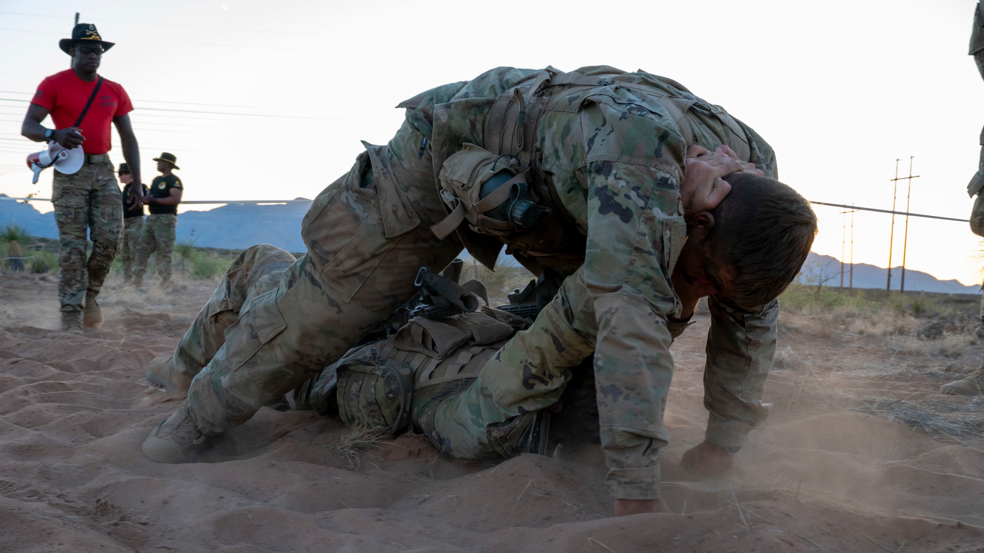 U.S. Space Force 1st Lt. Jordan Savage, Los Angeles Air Force Base space systems command project manager, carries his teammate through the sand during a Spur Ride at Fort Bliss, Texas, April 29, 2024.