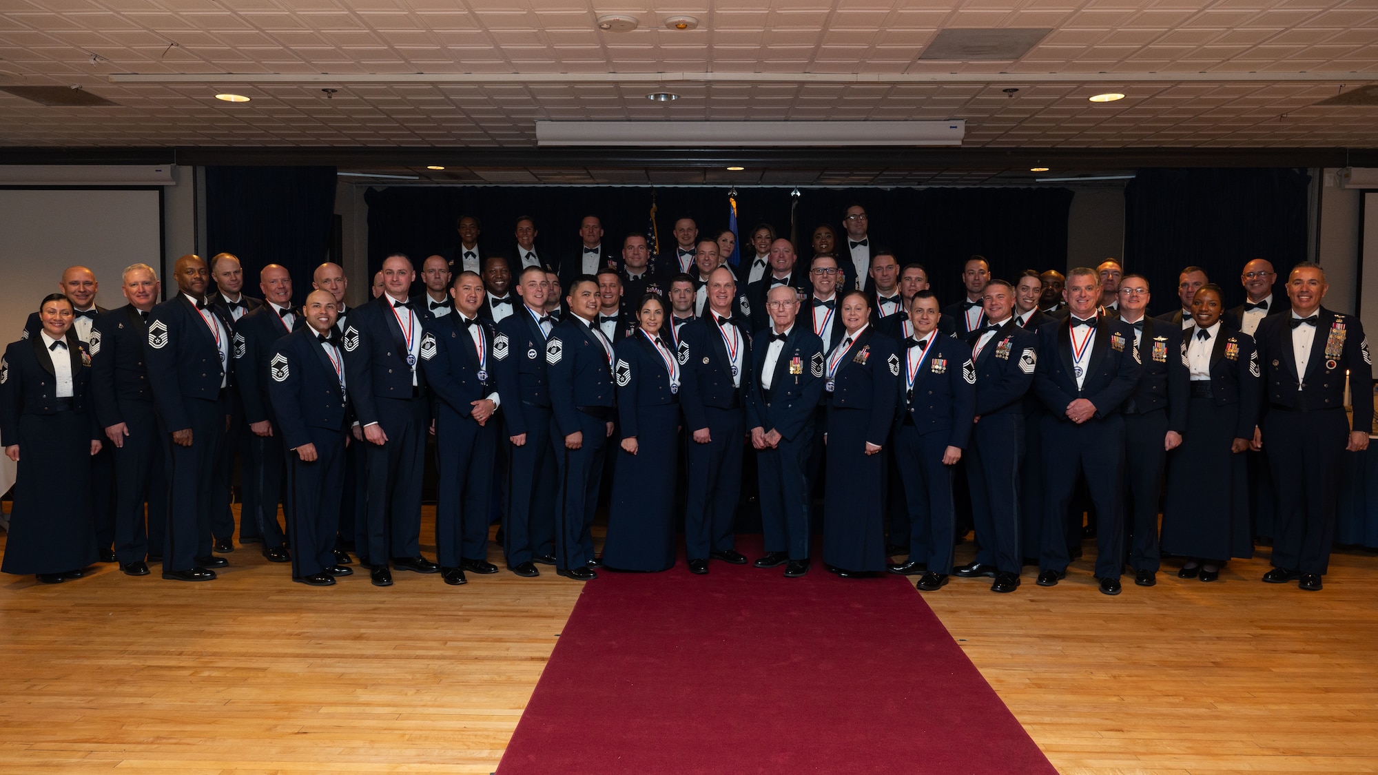 Chief master sergeants and chief master sergeant-selects gather for a photo during the Chief Recognition Ceremony at the Hub at Peterson Space Force Base, Colorado, May 9, 2024. Chief master sergeants serve in the highest enlisted grade and hold strategic leadership positions.  (U.S. Space Force photo by Staff Sgt. Natalie Rubenak)