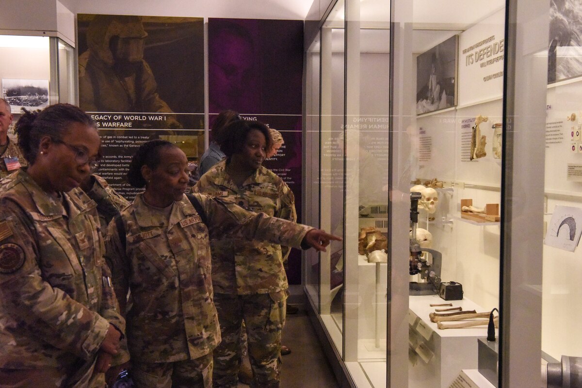 Image of Airmen looking at a display.