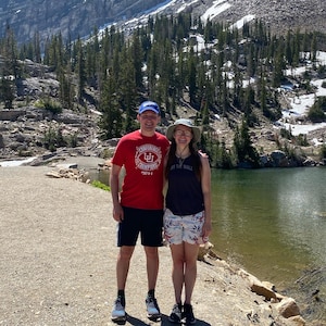 At the time fiancés, Thomas Grebe, left, and Olivia Bithell pose for a photo in front of Silver Lake, Park City, Utah, on June 13, 2021.
