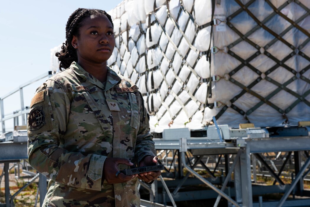 Airman operates loader remotely