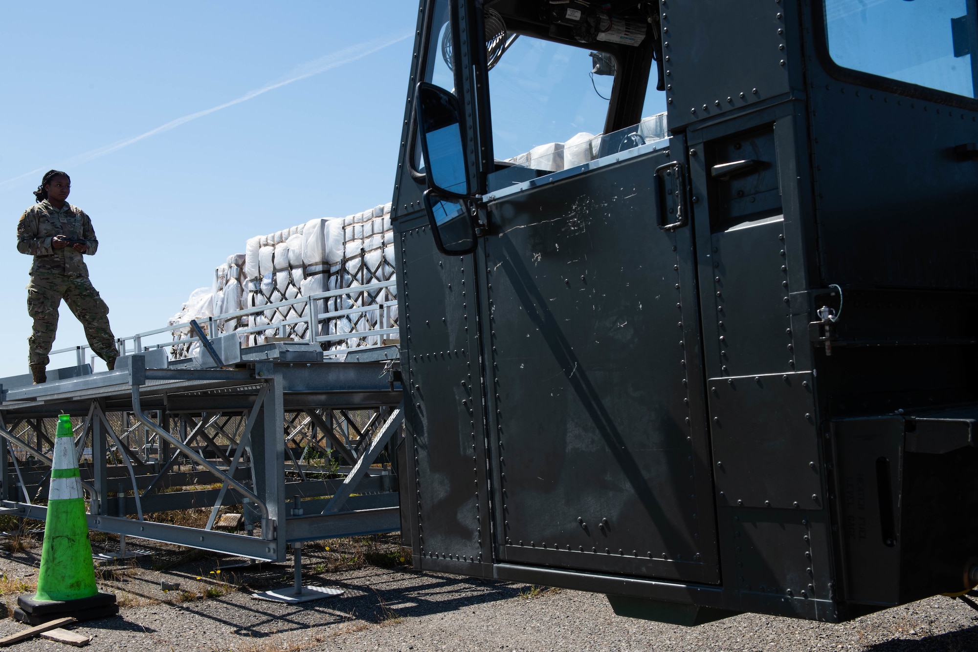 Airman operates loader remotely