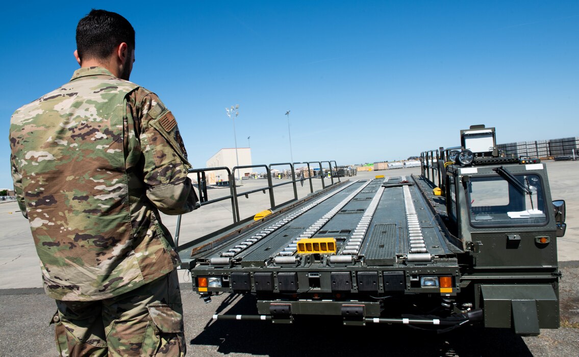 Airman operates loader remotely