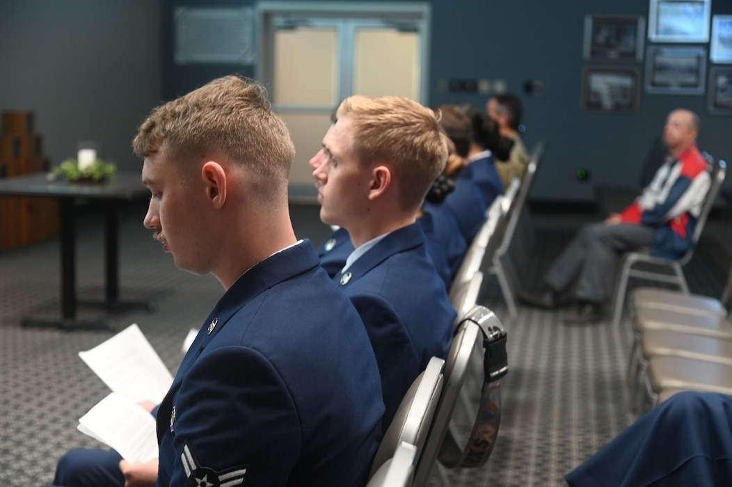 U.S. Air Force Airmen wait for their turn to speak as part of the annual Holocaust Memorial Ceremony at the Powell Event Center, Goodfellow Air Force Base, Texas, May 6, 2024. Featured speakers went up to the podium and read the tragic testimonies of the victims of the Holocaust. (U.S. Air Force photo by Airman James Salellas)