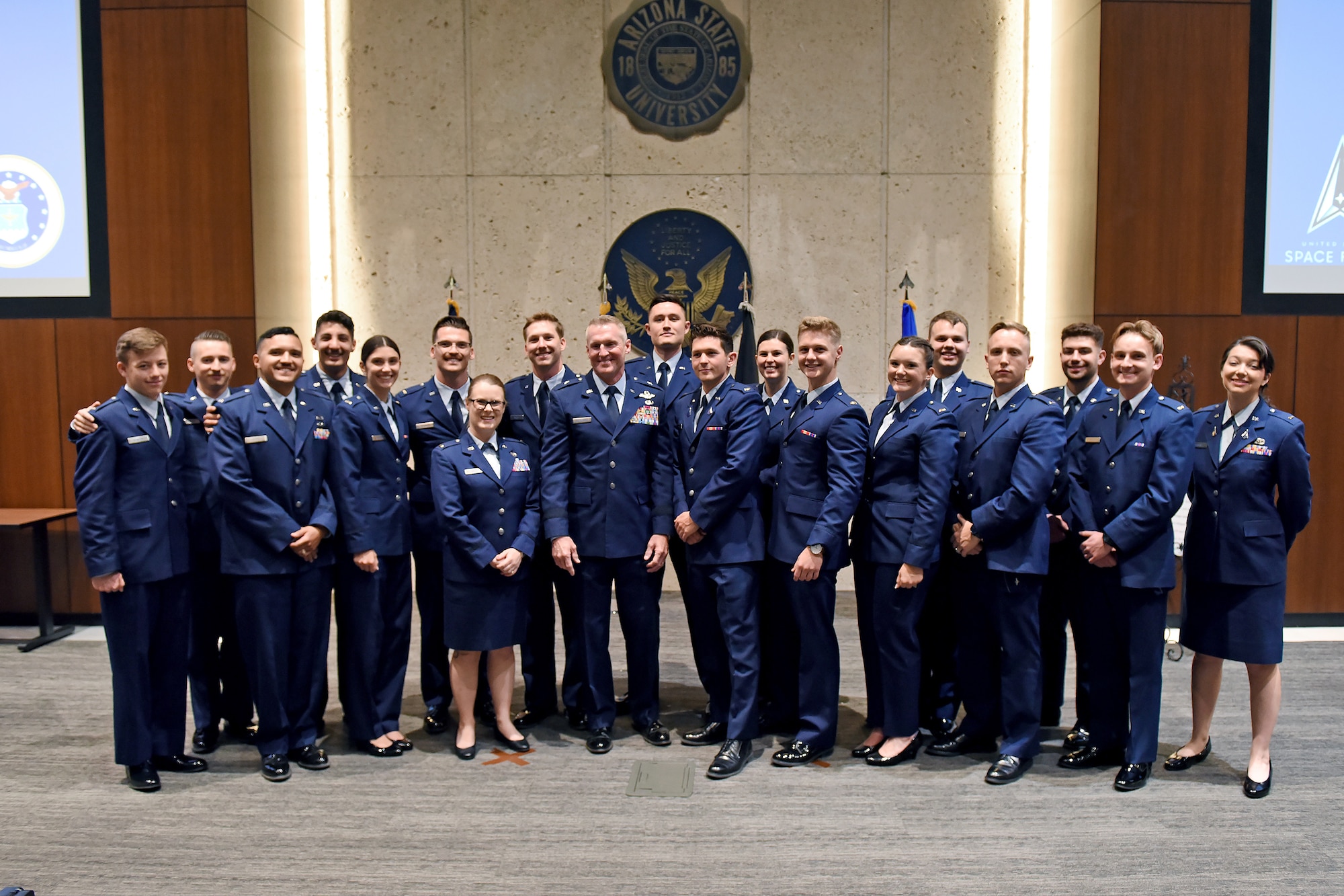 U.S. Air Force Brig. Gen. Jason Rueschhoff (center left), 56th Fighter Wing commander, poses for a group photo at the Air Force Reserve Officer Training Corps Detachment 025’s Commissioning Ceremony May 8, 2024, at Arizona State University, Arizona.