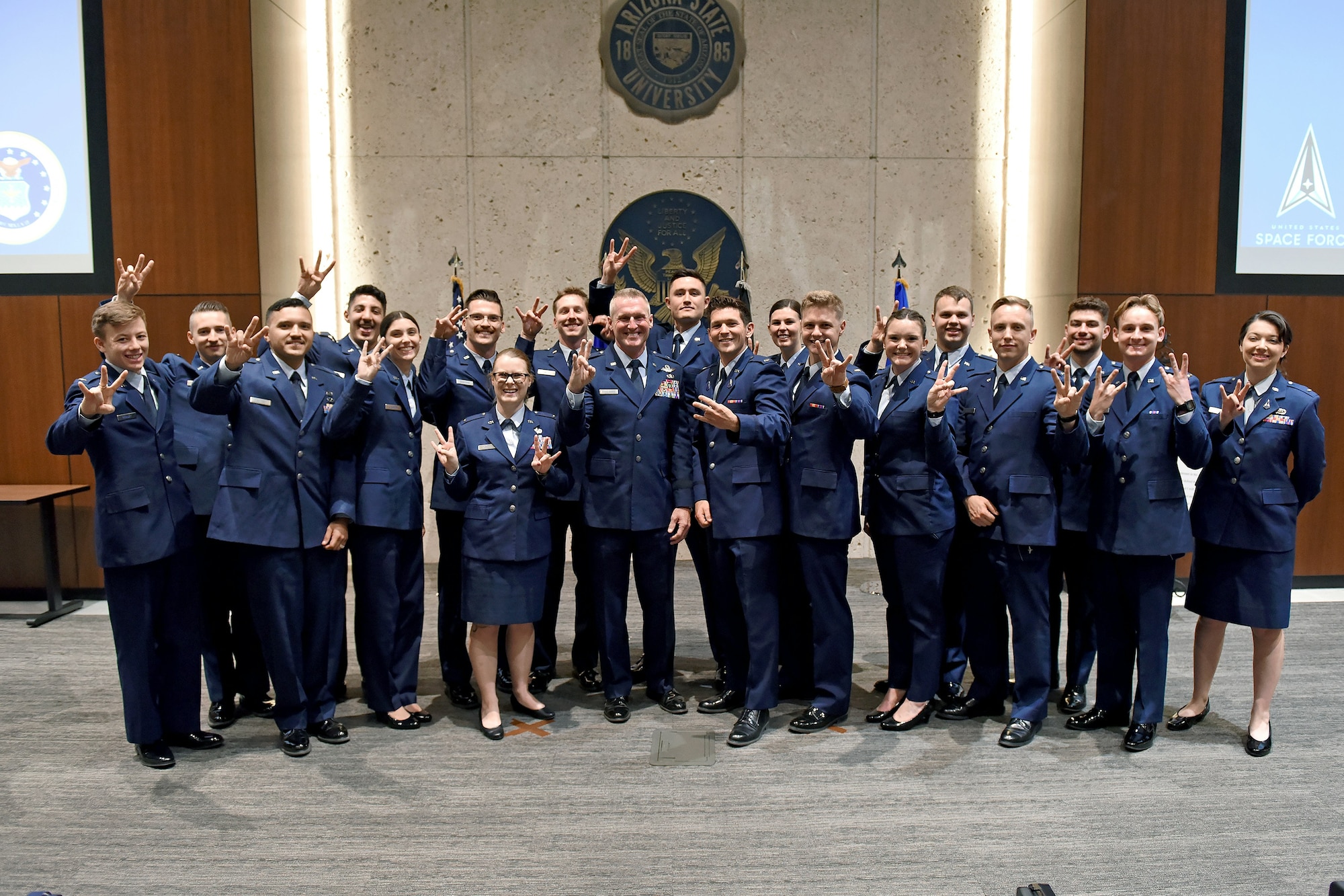 U.S. Air Force Brig. Gen. Jason Rueschhoff (center left), 56th Fighter Wing commander, poses for a group photo at the Air Force Reserve Officer Training Corps Detachment 025’s Commissioning Ceremony May 8, 2024, at Arizona State University, Arizona.