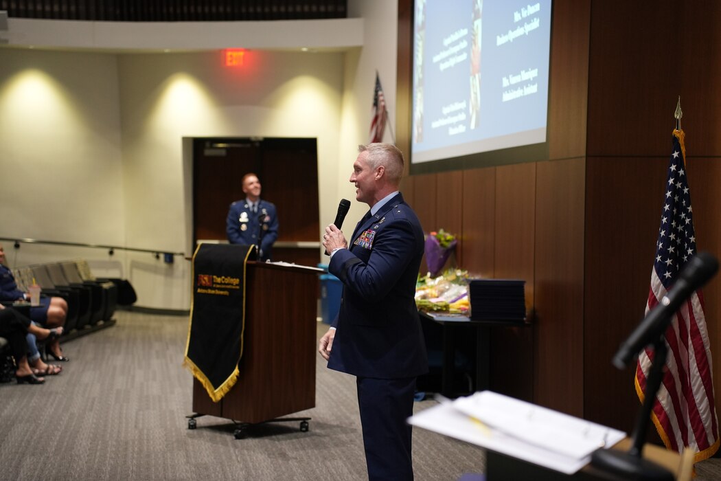 U.S. Air Force Brig. Gen. Jason Rueschhoff, 56th Fighter Wing commander, speaks at the Air Force Reserve Officer Training Corps Detachment 025’s Commissioning Ceremony May 8, 2024, at Arizona State University, Arizona.