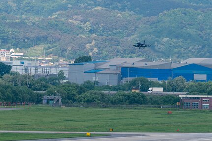 A U.S. Air Force F-16 Fighting Falcon assigned to the 36th Fighter Squadron prepares to land on a runway at Osan Air Base, Republic of Korea, May 8, 2024. Fourteen aircraft returned to Osan AB from Red Flag-Alaska 24-1. RF-A is a Pacific Air Forces-led training that is designed to enhance air operations, improve interoperability and strengthen alliances and partnerships. (U.S. Air Force Photo by Senior Airman Kaitlin Frazier)