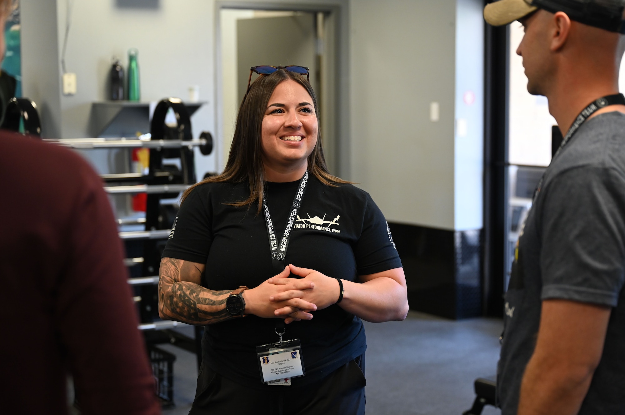 A photo of an Airman smiling.