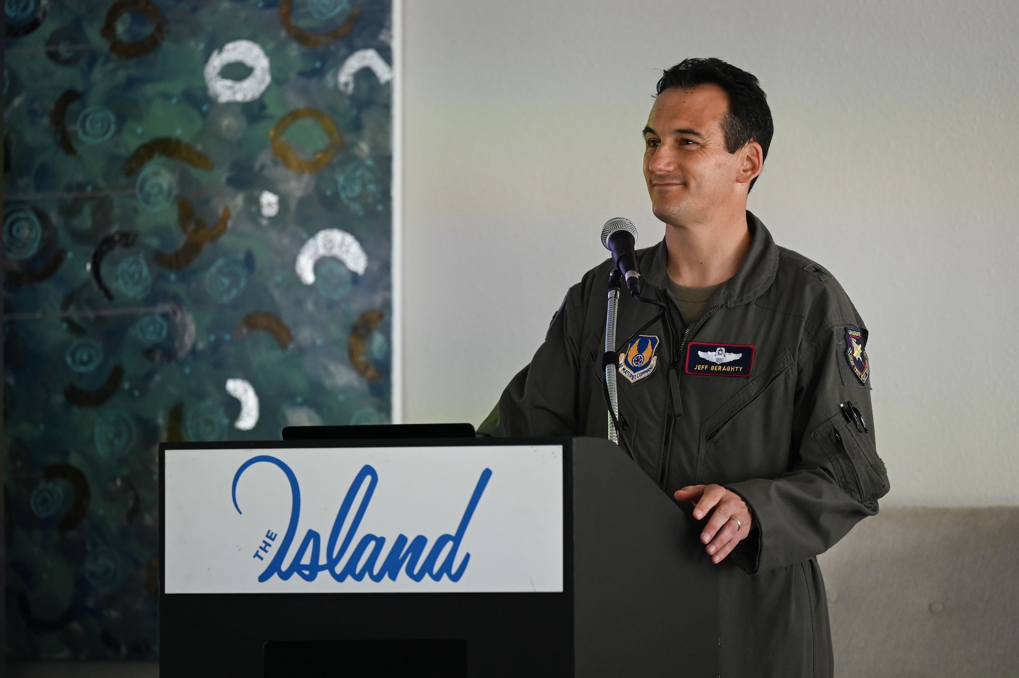 A photo of an Airman speaking.