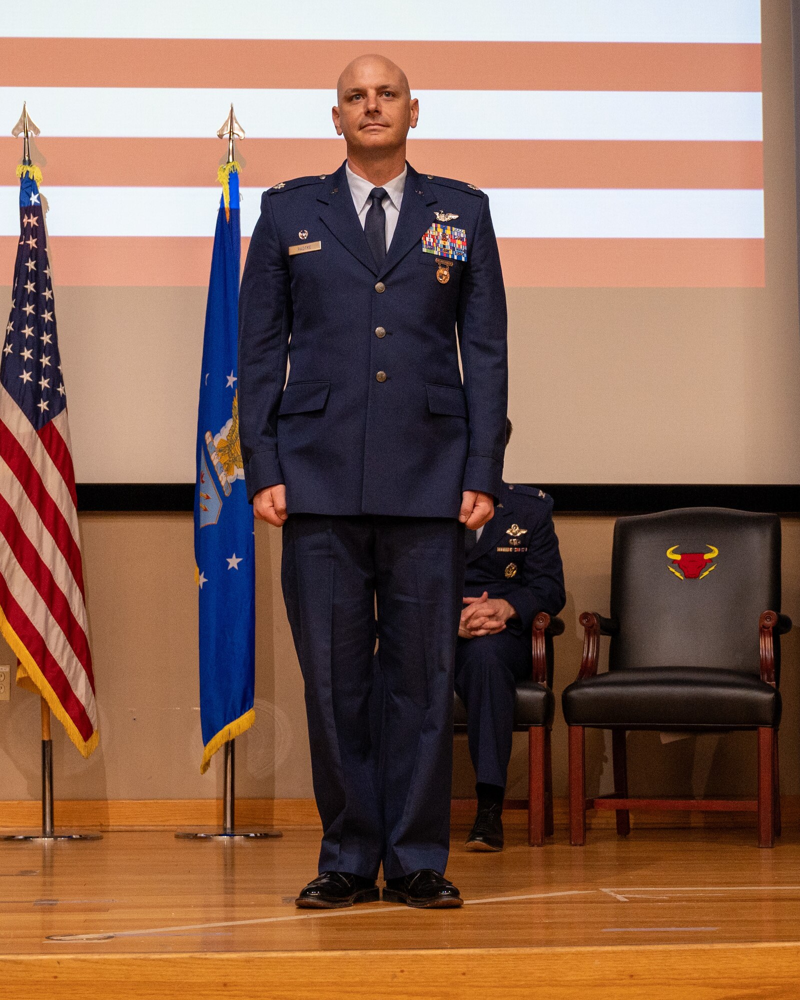 U.S. Air Force Lt. Col. Johnathan Radtke, stands at attention after becoming the 87th Flying Training Squadron commander at the 87th FTS change of command ceremony at Laughlin Air Force Base, Texas, May 9, 2024. As commander, Radtke will oversee 57 Airmen engaged in executing more than 11,870 T-38C Talon sorties yearly. (U.S. Air Force photo by Staff Sgt. Nicholas Larsen)