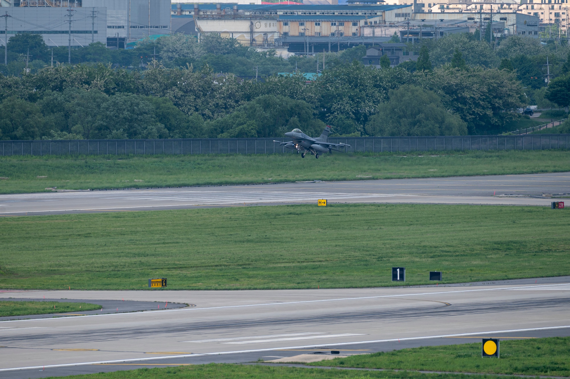 A U.S. Air Force F-16 Fighting Falcon assigned to the 36th Fighter Squadron approaches a runway at Osan Air Base, Republic of Korea, May 8, 2024. Red Flag-Alaska 24-1 provided pilots from the 36th FS with realistic air, ground and electronic combat training in a joint and combined environment. (U.S. Air Force Photo by Senior Airman Kaitlin Frazier)