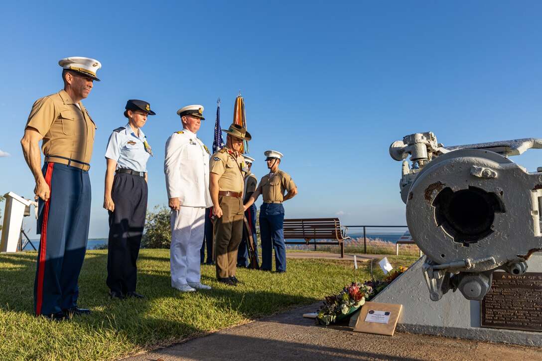 From Left; U.S. Marine Corps Col. Brian T. Mulvihill, the commanding officer of Marine Rotational Force – Darwin 24.3, Royal Australian Air Force Wing Cmdr. Lauren Guest, the senior Australian Defence Force officer of RAAF Base Darwin, Royal Australian Navy Capt. Mitchell Livingstone, the commanding officer of Headquarters Northern Command, and Australian Army Brigadier Douglas Pashley, the commander of 1st Brigade, stand at attention during the 82nd Battle of the Coral Sea commemorative service at the USS Peary Memorial, Darwin, NT, Australia, May 4, 2024. MRF-D 24.3 Marines paid their respects alongside their Australian Allies during the ceremony. The ceremony commemorated U.S. and Australian service members who lost their lives in the Battle of the Coral Sea, which took place from May 4-8, 1942, during WWII. (U.S. Marine Corps photo by Cpl. Manuel Rivera)