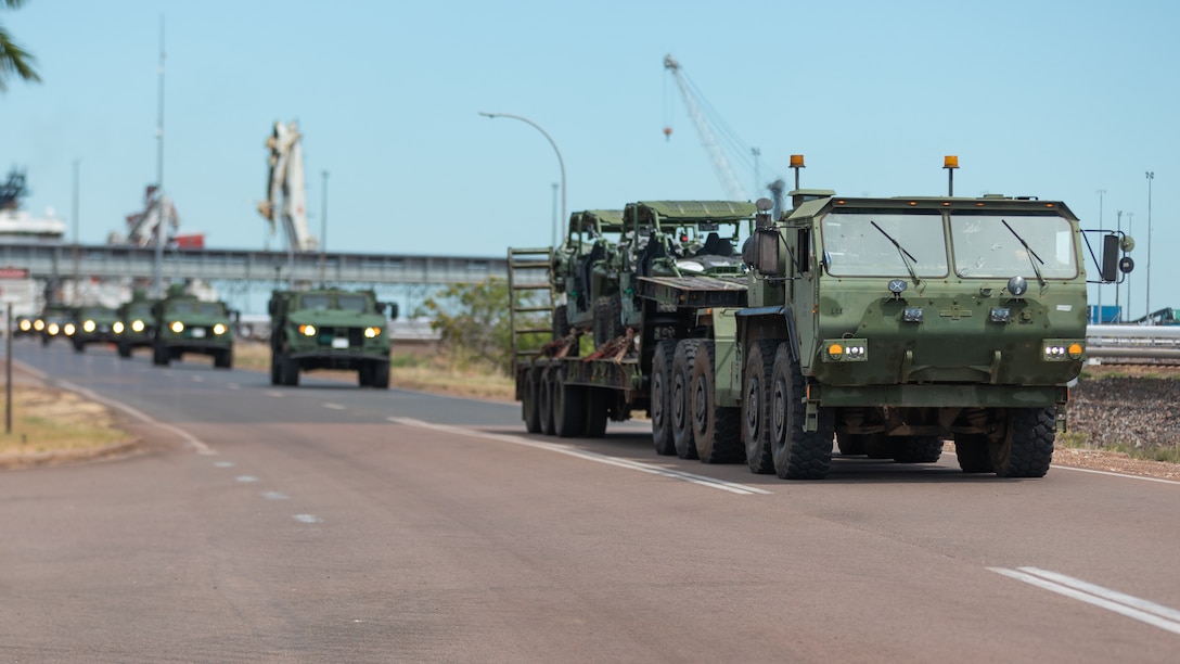 U.S. Marines with Marine Rotational Force Darwin – 24.3, operate tactical vehicles at Port Darwin, NT, Australia, April 22, 2024. Vehicles and equipment were delivered to Marines at Port Darwin for use throughout the MRF-D 24.3 deployment. MRF-D 24.3 is part of an annual six-month rotational deployment to enhance interoperability with the Australian Defence Force and Allies and partners and provide a forward-postured crisis response force in the Indo-Pacific. (U.S. Marine Corps photo by Cpl. Migel A. Reynosa)