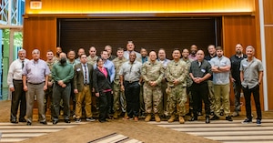 Attendees of the Land Mobile Radio Strategy Summit pose for a photo.