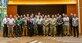 Attendees of the Land Mobile Radio Strategy Summit pose for a photo at Kadena Air Base, Japan, April 9 – 11, 2024. The summit aimed to chart a course forward for the Indo-Pacific Command Area of Responsibility, focusing on enhancing seamless LMR communications.