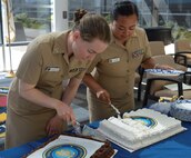 a cut above...Navy Nurse Corps celebrated the Navy Nurse Corps 116th birthday and culmination of National Nurses Week with a traditional cake cutting portion of the ceremony to honor all nurses - 95 with approximately 50 Navy Nurse Corps officers - assigned to NHB/NMRTC Bremerton (Official Navy photo by Douglas H Stutz, NHB/NMRTC Bremerton).