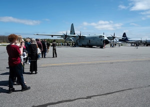 people standing in line to see WC-130J aircraft in Maine
