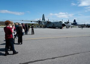 people standing in line to see WC-130J aircraft in Maine