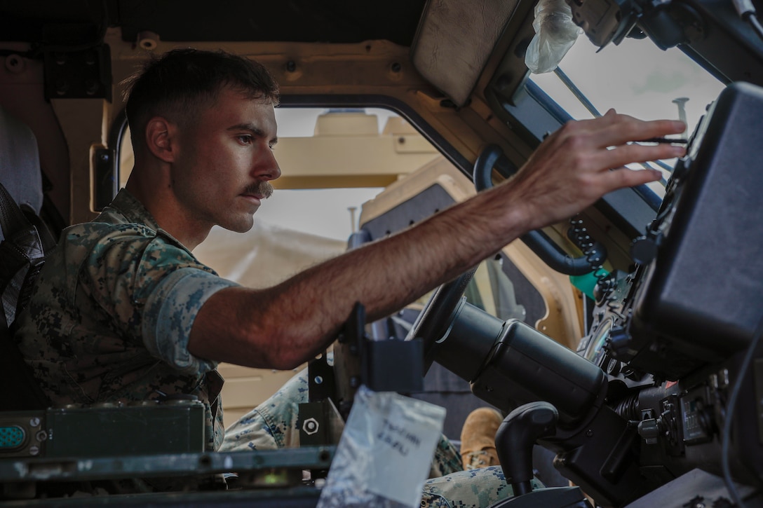 U.S. Marine Corps Cpl. Gage Barbieri, a Florida native and corporals course instructor with Headquarters Battalion, 2d Marine Division, works on a Joint Light Tactical Vehicle on Camp Lejeune, North Carolina, April 4, 2024. Motor Transport operators are responsible for maintaining and operating both commercial and tactical vehicles. (U.S. Marine Corps photo by Cpl. Megan Ozaki)