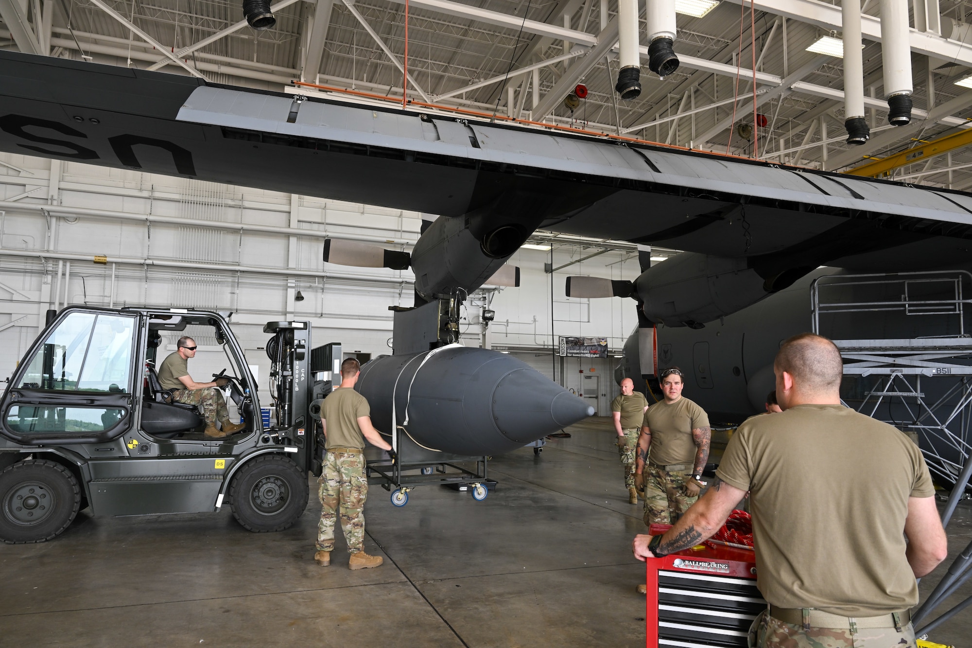 Members of the 910th Maintenance Squadron complete the removal of a fuel tank from the wing of a C-130H Hercules aircraft at Youngstown Air Reserve Station, Ohio, May 7, 2024.