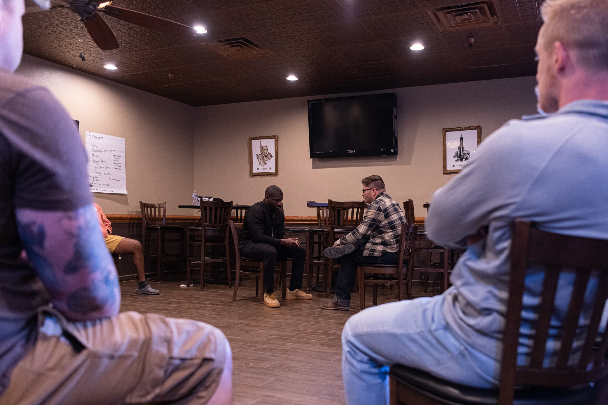 U.S. Air Force Airmen assigned to the 27th Special Operations Wing participate in a roleplay exercise during the Applied Suicide Intervention Skills Training (ASIST) workshop at Cannon Air Force Base, New Mexico, May 7, 2024. The two-day ASIST workshop utilized lectures, videos, roleplaying sessions and group conversation to help participants understand how personal and societal attitudes affect views on suicide and suicide interventions. (U.S. Air Force photo by Senior Airman Drew Cyburt)