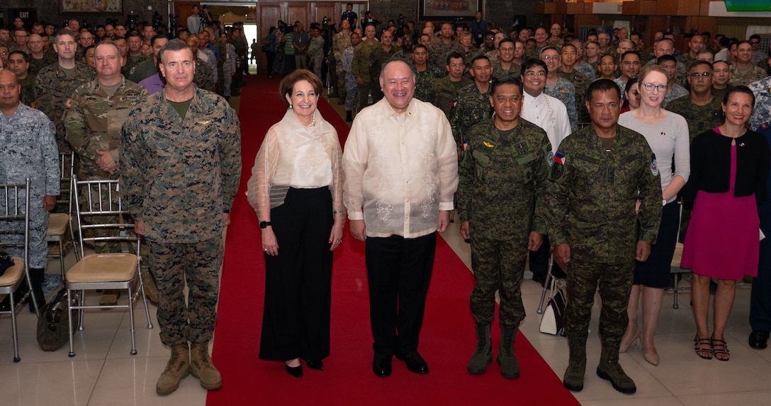 Philippine and U.S. government and military representatives pose for a photo at the closing ceremony for Exercise Balikatan 24 at Camp Aguinaldo, Manila, Philippines, May 10, 2024. BK 24 is an annual exercise between the Armed Forces of the Philippines and the U.S. military designed to strengthen bilateral interoperability, capabilities, trust, and cooperation built over decades of shared experiences. (U.S. Air Force photo by Staff Sgt. Pedro Tenorio)