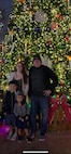 taff Sgt. Carlie Stonebraker stands with her children and father, retired Senior Master Sgt. Royce Cook, at a Christmas event in Fredericksburg, Texas, December 2019.  Stonebraker followed in her father’s footsteps and committed to a career of service through the U.S military.