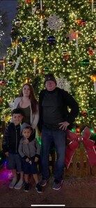 taff Sgt. Carlie Stonebraker stands with her children and father, retired Senior Master Sgt. Royce Cook, at a Christmas event in Fredericksburg, Texas, December 2019.  Stonebraker followed in her father’s footsteps and committed to a career of service through the U.S military.