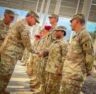 U.S. Army Lt. Col. Cathy Alston, Women’s Peace and Security lead for Southern Fenix 2024 shakes hands with Commander in Chief of the 6th Division of the Chilean Army, Brig. Gen. Ruben Castillo Herrera on the opening day of the mid-planning conference, April 1, 2024 in Iquique, Chile. Southern Fenix 24 (SF24) is a bi-lateral exercise between the U.S. Army and the Chilean Army (CHLAR) in Iquique, Chile. This will be the first U.S. Army-led exercise where the U.S. Army M142 High Mobility Artillery Rocket System (HIMARS) platform is deployed to the United States Southern Command area of operation and piloting new warfighting concepts in partnership with Chile.