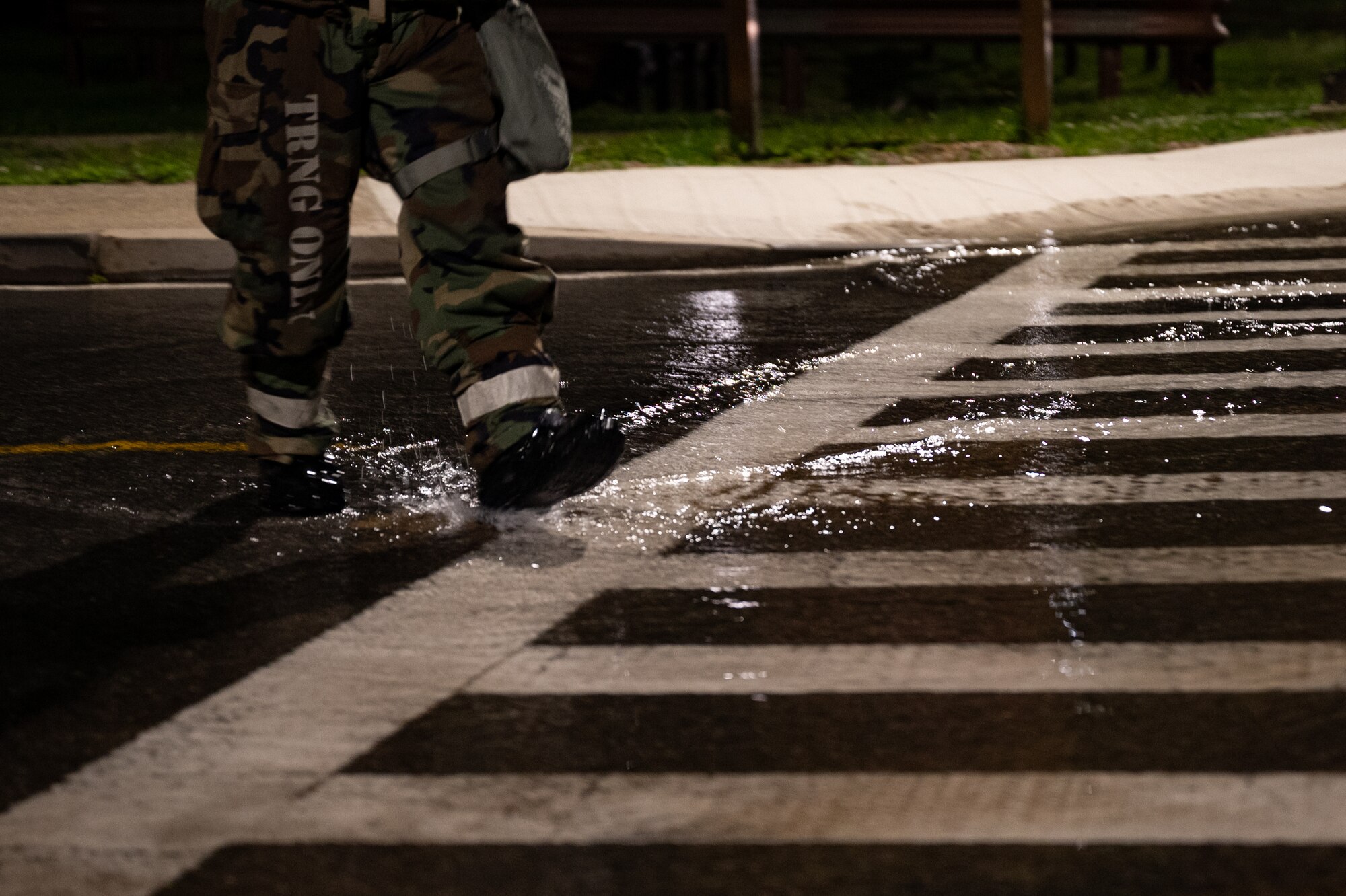 U.S. Air Force Tech. Sgt. Bryan Calles, 51st Fighter Wing wing inspection team member, walks toward a damaged fire hydrant after a simulated missile attack during Beverly Herd 24-1 at Osan Air Base, Republic of Korea, May 13, 2024. The Airmen of the 51st FW continuously train to maintain the high level of full-spectrum readiness required to execute the mission proficiently and effectively. Routine training like Beverly Herd are pivotal platforms for 51st FW Airmen to refine their warfighting proficiencies through practical application, concurrently enhancing their ability to respond skillfully to contingencies. (U.S. Air Force photo by Senior Airman Brittany Russell)