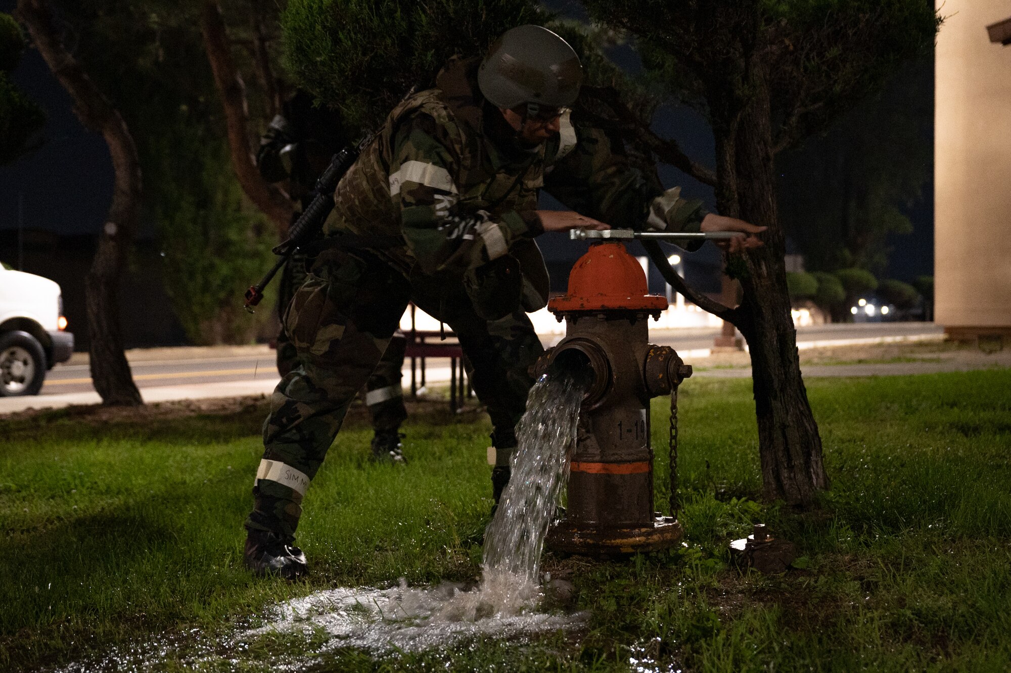 A U.S. Air Force Airman assigned to the 51st Civil Engineer Squadron repairs a damaged fire hydrant caused by a simulated missile attack during Beverly Herd 24-1 at Osan Air Base, Republic of Korea, May 13, 2024. As the most forward deployed permanently based wing in the Air Force, the 51st Fighter Wing is charged with providing mission-ready Airmen to execute combat operations and receive follow-on forces. Routine training like Beverly Herd are pivotal platforms for 51st FW Airmen to refine their warfighting proficiencies through practical application, concurrently enhancing their ability to respond skillfully to contingencies.  (U.S. Air Force photo by Senior Airman Brittany Russell)