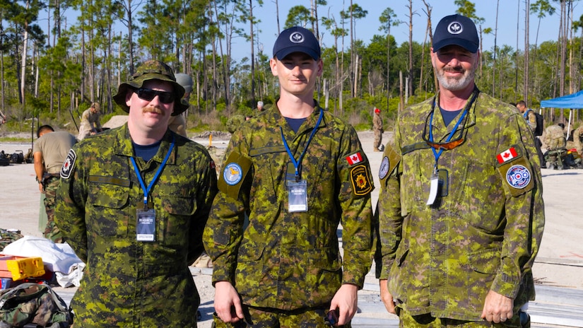 Troops pose for a photo.