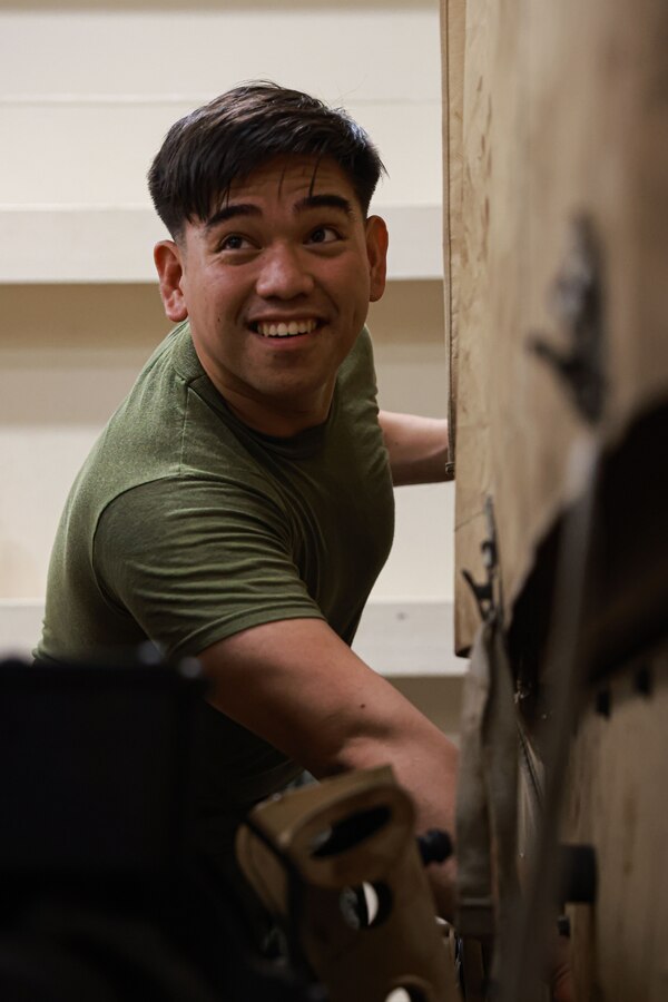 U.S. Marine Corps Sgt. Charles Gutierrez, an automotive maintenance technician assigned to Headquarters and Service Company, Battalion Landing Team 1/5, 15th Marine Expeditionary Unit, and a native of the Philippines, works on a Joint Light Tactical Vehicle attached to BLT 1/5, 15th MEU, aboard the amphibious transport dock USS Somerset (LPD 25) in the South China Sea May 10, 2024. BK 24 is an annual exercise between the Armed Forces of the Philippines and the U.S. military designed to strengthen bilateral interoperability, capabilities, trust, and cooperation built over decades of shared experiences. (U.S. Marine Corps photo by Cpl. Aidan Hekker)