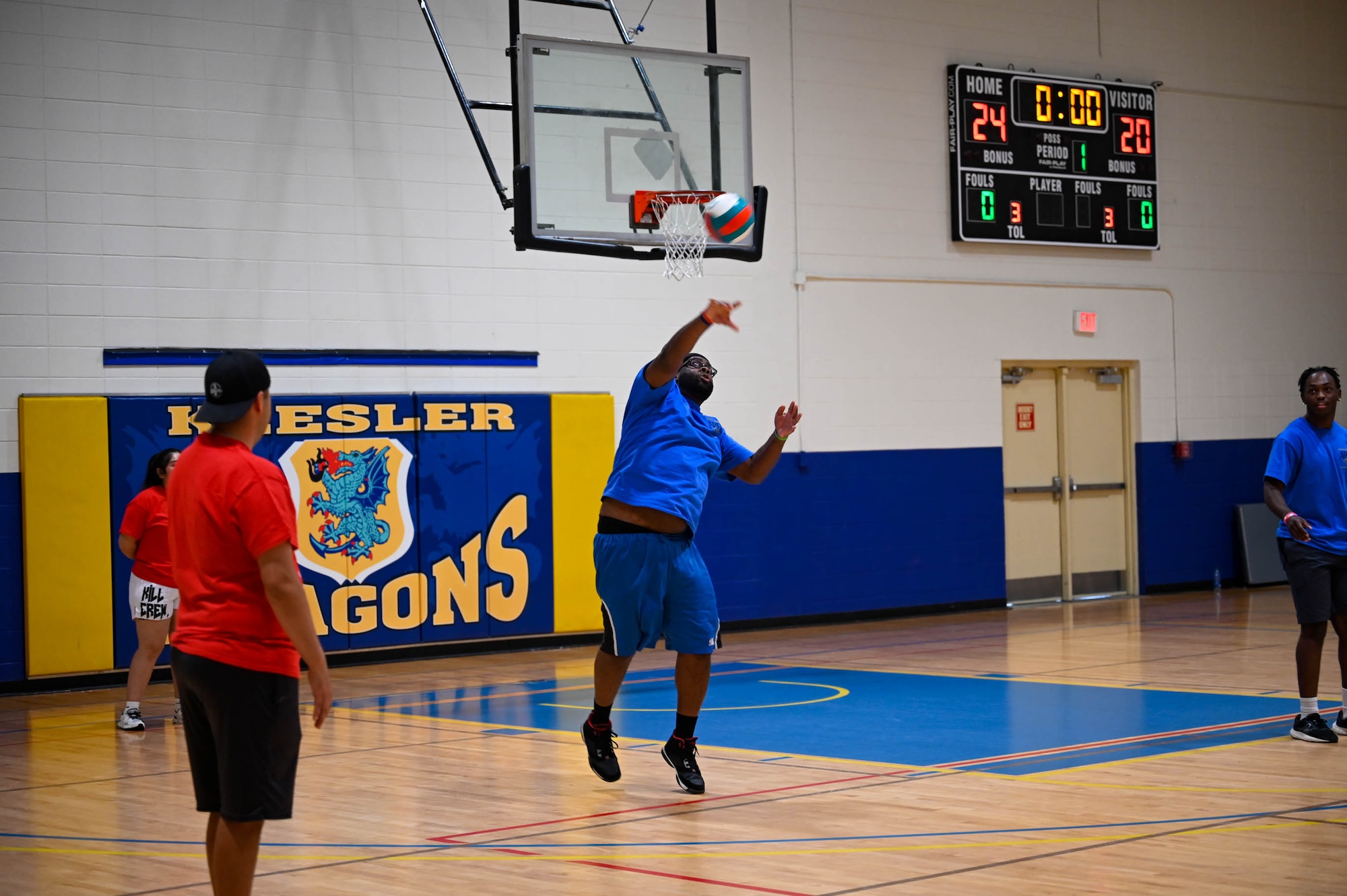 A Special Olympics Mississippi athlete serves a volleyball at Keesler Air Force Base, Mississippi, May 11, 2024.