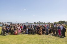 U.S. Marines, Sailors, and civilians, pose for a group photo during a volunteer appreciation event at Marine Corps Recruit Depot San Diego, California, April 30, 2024. The event was held to show appreciation for the Marines, Sailors, and civilians that assisted with volunteer events across the Depot and the local communities. (U.S. Marine Corps photo by Lance Cpl. Janell B. Alvarez)