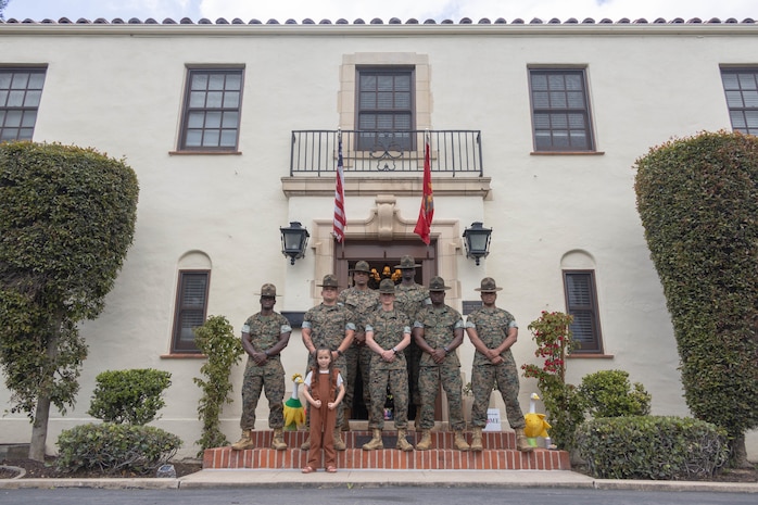 U.S. Marines with Support Battalion and Recruit Training Regiment, pose for a photo during an appreciation event at Marine Corps Recruit Depot San Diego, California, May 1, 2024. The event was hosted by the Commanding General of MCRD San Diego to show appreciation for the Marines’ hard work and their spouses. (U.S. Marine Corps photo by Lance Cpl. Janell B. Alvarez)