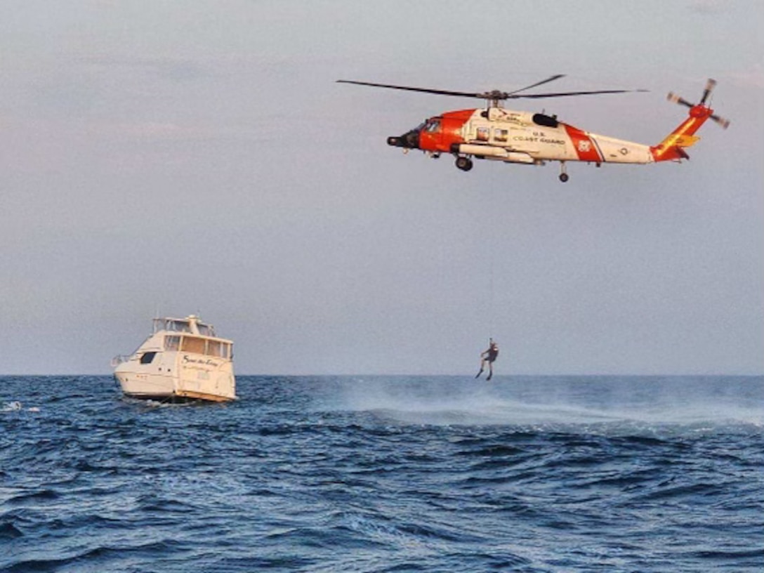 Coast Guard crews rescued three people and one dog after their vessel began taking on water 35 miles west of Clearwater, May 13, 2024. A Coast Guard Air Station Clearwater MH-60T Jayhawk helicopter aircrew and Coast Guard Station Sand Key 45-foot Response Boat-Medium boat crew spotted all three people aboard their vessel at approximately 6:45 a.m. The aircrew deployed their rescue swimmer who swam two people from the 47-foot vessel to the response boat in 5 to 6-foot seas and 10-15 knot winds. The boat crew retrieved both boaters from the water and transferred two boat crewmen with a Coast Guard P6 pump to dewater the vessel once the sea state improved. Upon boarding the vessel the boat crew observed the vessel taking on water through a broken window. Using a mattress and boat hooks, the boat crew was able to plug and shore the window, effectively stopping the flooding. The boat crew escorted the vessel and passengers to Clearwater Harbor Marina around 6:30 p.m. and no injuries were reported. (U.S. Coast Guard Photo)