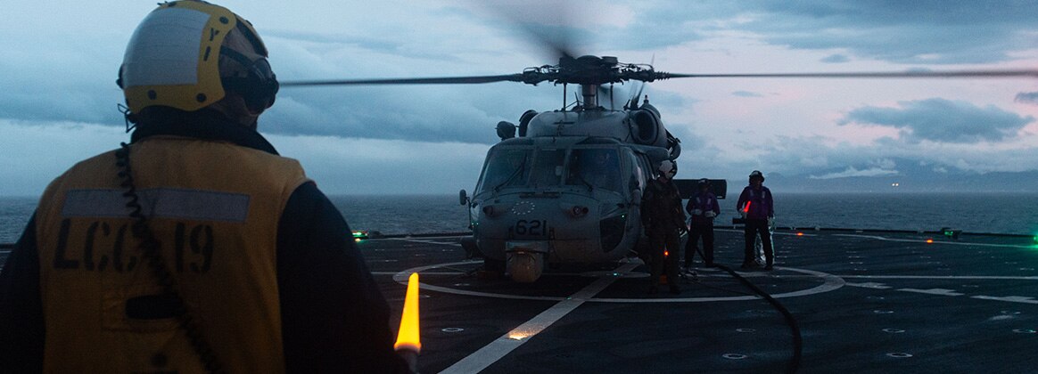 240507-N-RW305-1485 SAGAMI WAN (May 7, 2024) – Sailors aboard U.S. 7th Fleet flagship USS Blue Ridge (LCC 19) communicate with each other while supplying fuel to a MH-60S Seahawk helicopter assigned to the “Golden Falcons” of (HSC) 12 on the flight deck, May 7. As the 7th Fleet flag ship, USS Blue Ridge is the oldest operational ship in the Navy and routinely operates with allies and partners in preserving a free and open Indo-Pacific region. (U.S. Navy photo by Mass Communication Specialist Seaman Thomas Furnish)