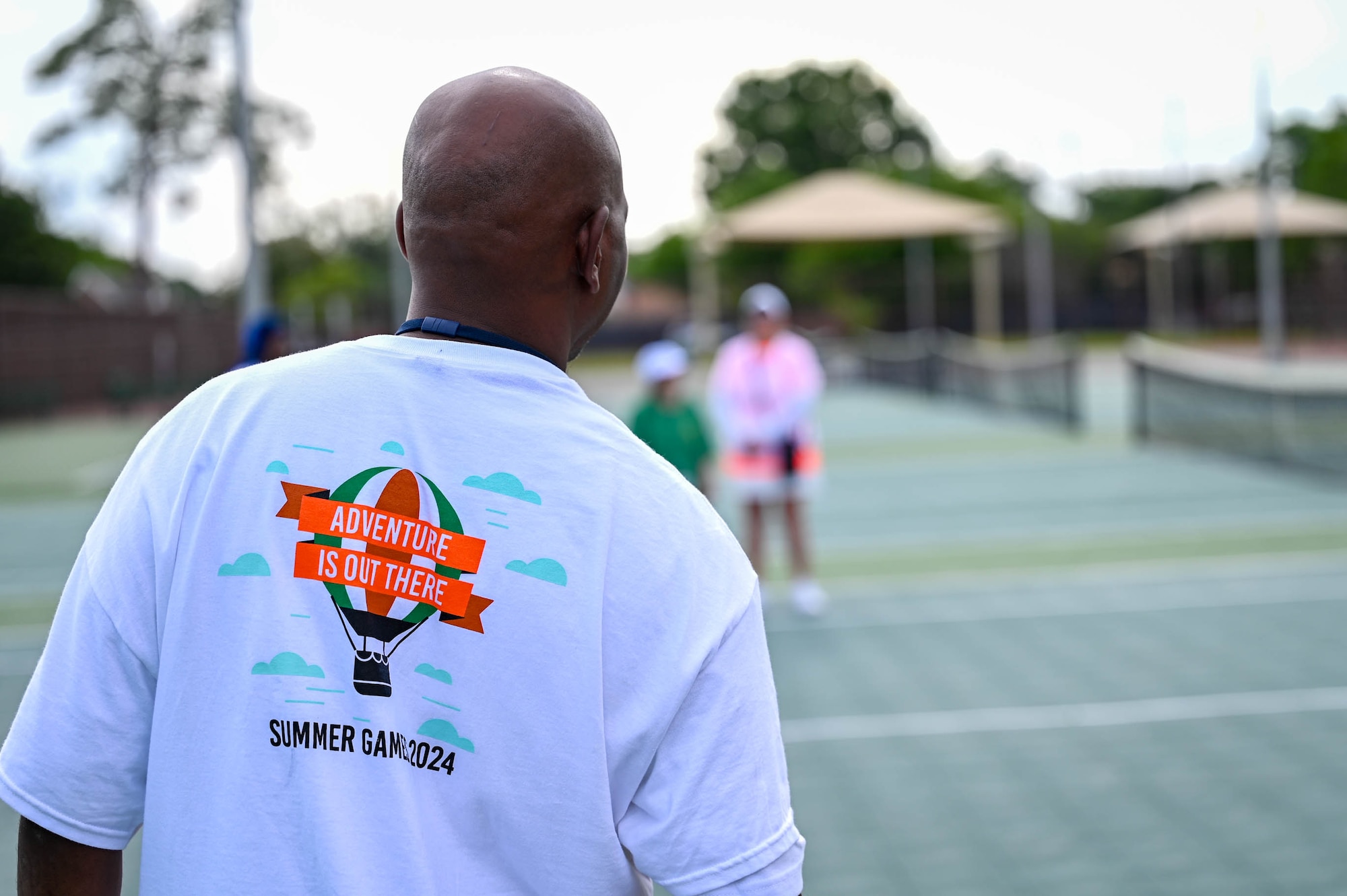 A Special Olympics Mississippi athlete plays tennis at Keesler Air Force Base, Mississippi, May 11, 2024.