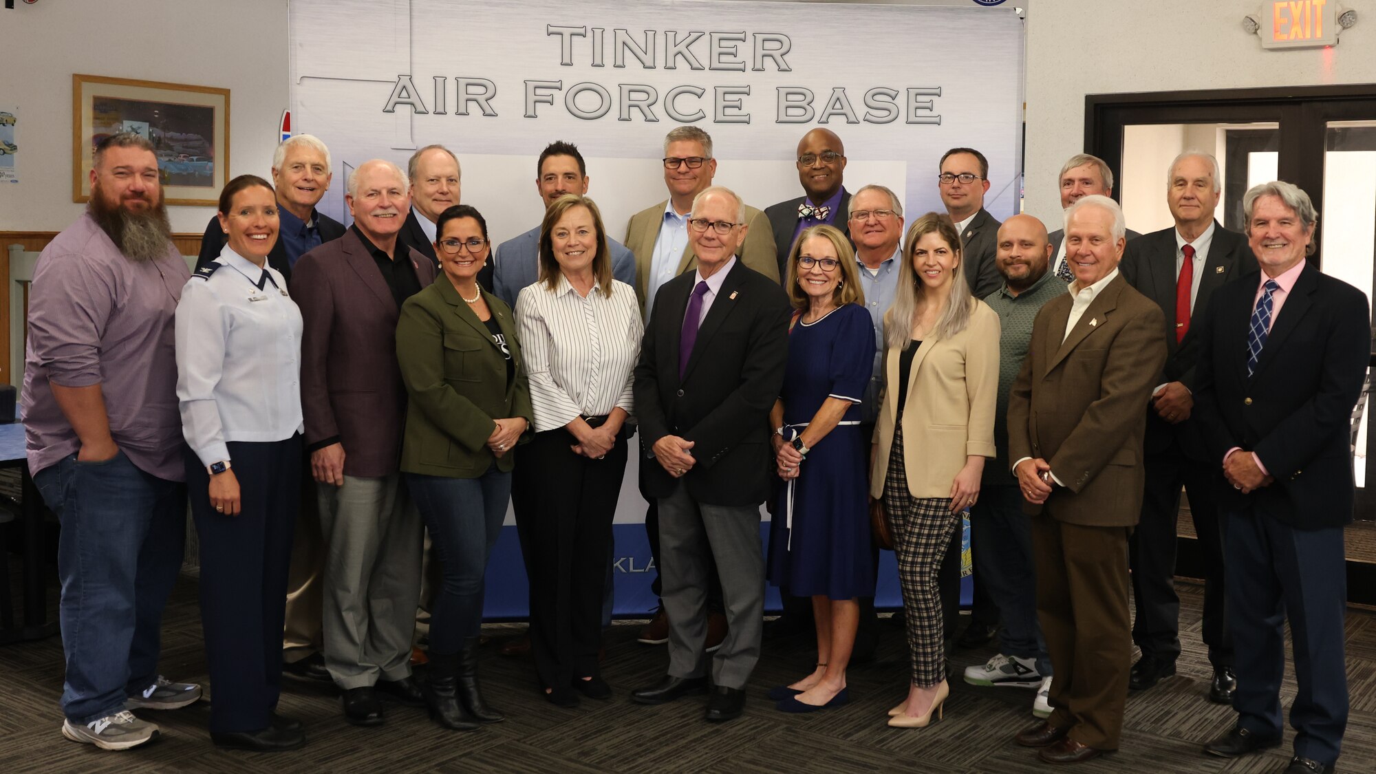a group photo of men and women